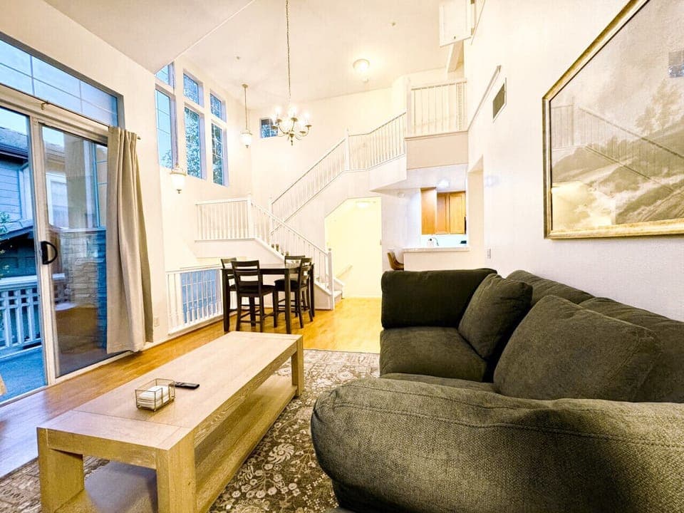 Nice view of the open floor plan and sliding doors to balcony