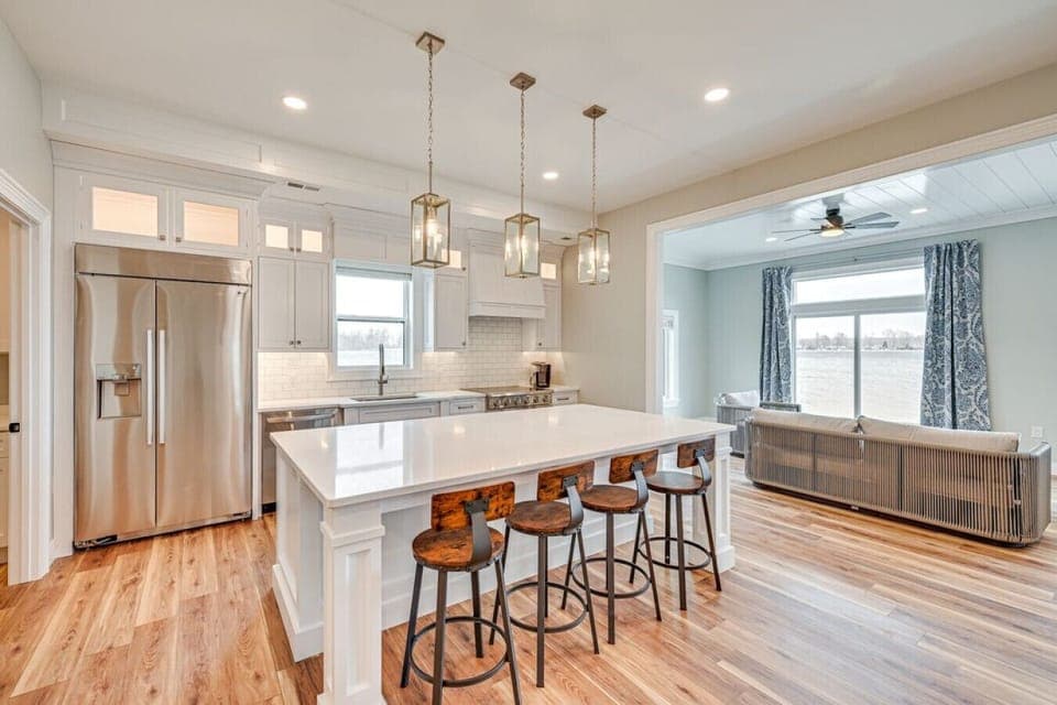 Bright Kitchen | Large Island with Seating | Pendant Lighting | Perfect for Casual Dining & Conversation