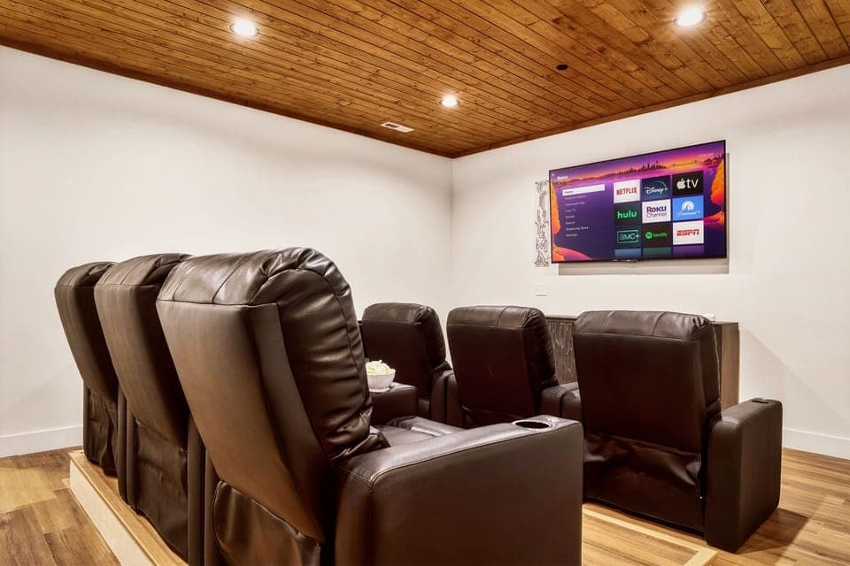 Enjoy a cozy movie night in leather recliners in your very own theater room.