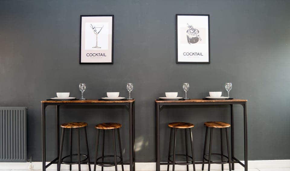 Twin breakfast bars positioned side by side, offering a comfortable and flexible dining space.