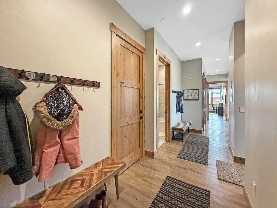 Entryway with storage for shoes and coats