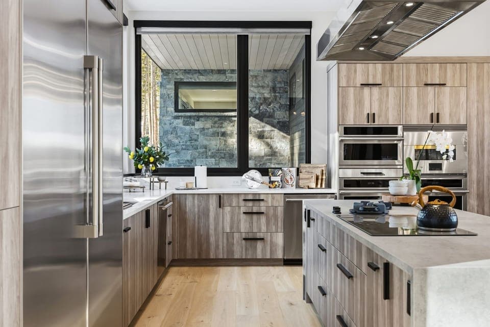 Entertainer's Kitchen – Dual oversized islands, pizza oven, double wall ovens, double dishwashers, and a full scullery create a true chef's workspace. 👨‍🍳🔥