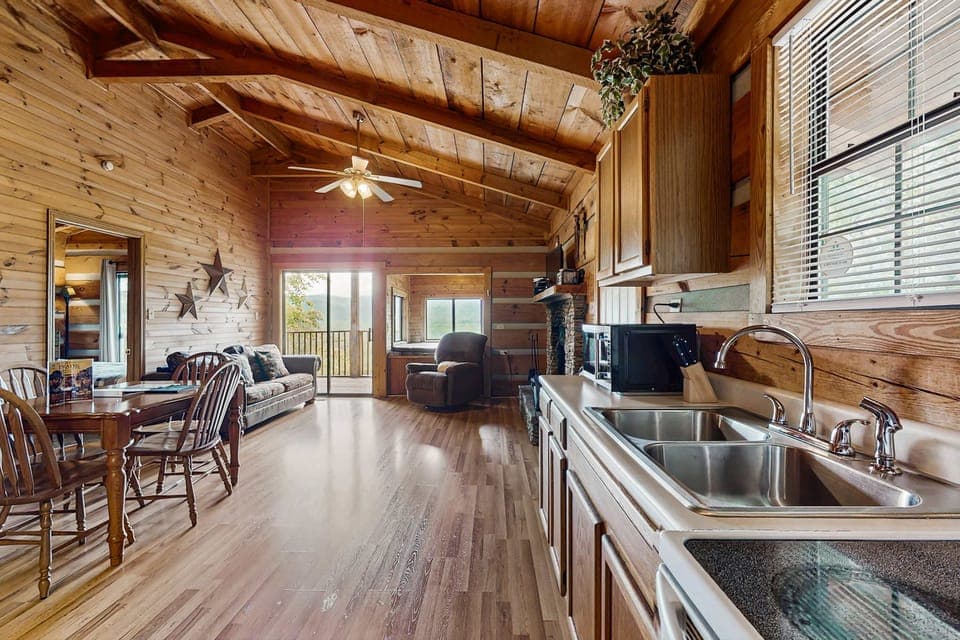 Brightly lit with mountain views, comfy seating, and rustic charm for perfect gatherings!