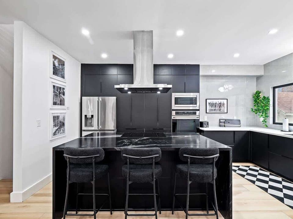 Sleek kitchen w/ stainless appliances ready for easy cooking.