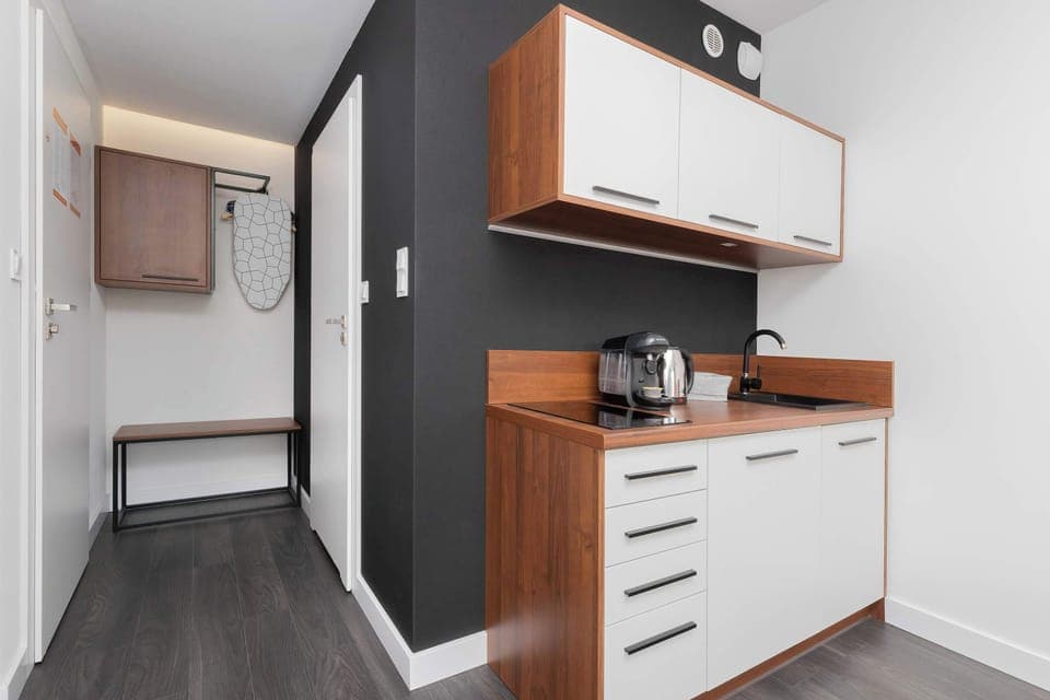 Kitchenette with a kettle.