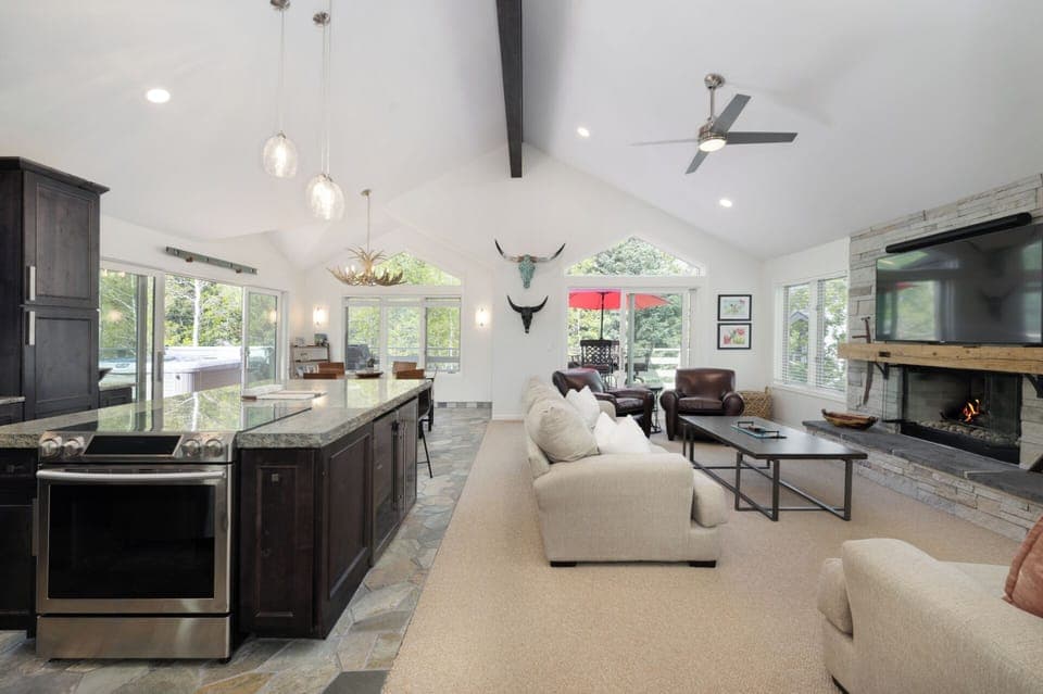 Spacious Kitchen Island, Pendant Lighting, Large Windows