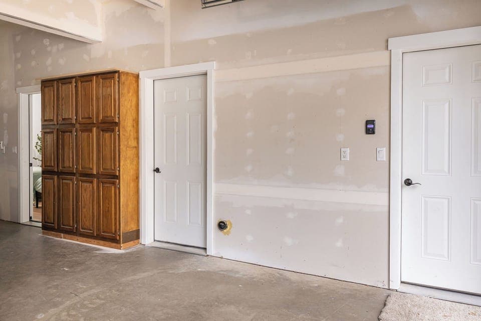 Left is the bedroom, middle is the bathroom, right leads to the entryway.