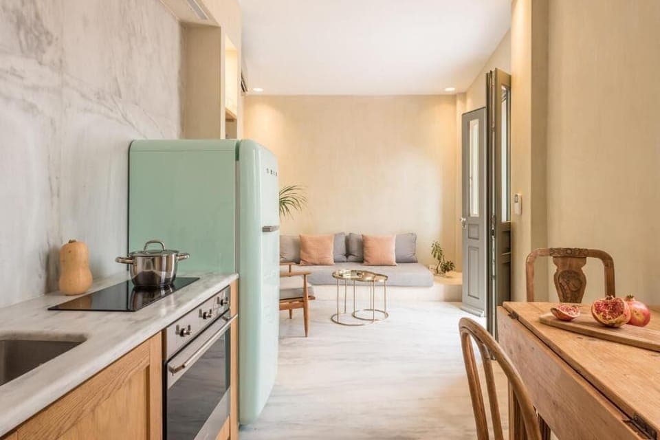 Enjoy effortless cooking in a stylish kitchen with retro fridge.