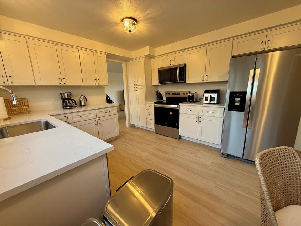 Full kitchen with all kinds of appliance