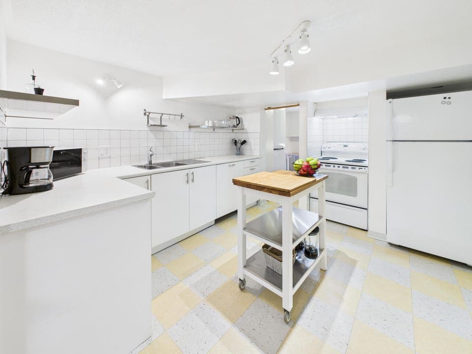 Sleek stainless steel and stone counters for the home chef!