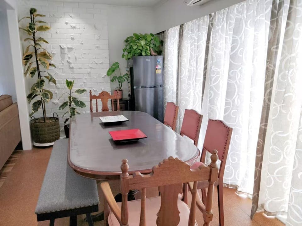 Spacious dining area ideal for shared meals and group gatherings.