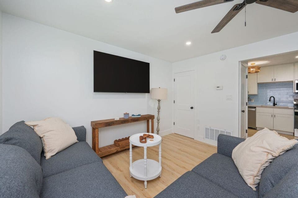 Cozy living room with a TV, perfect for relaxing after a day outdoors