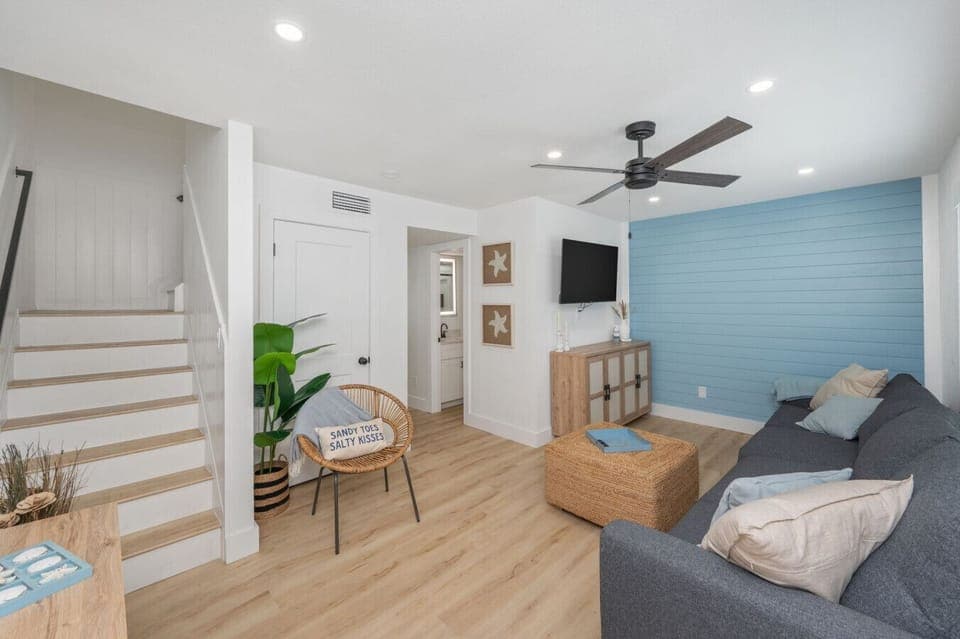 Cozy living room with a TV, perfect for relaxing after a day outdoors