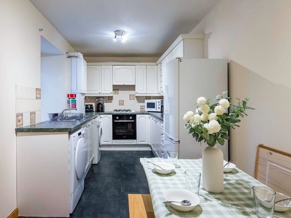 Interior Design, Furniture, Kitchen, Flooring, Major Appliance, Ceiling, Wood, Kitchen Appliance, Room, Floor