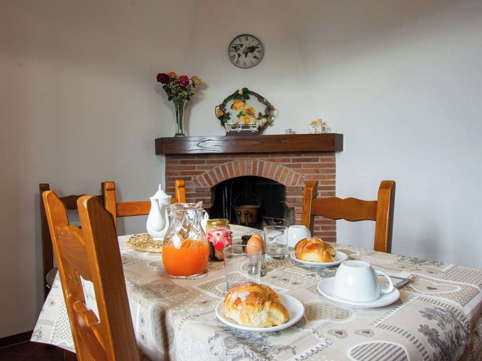 Furniture, Wood, Interior Design, Lighting, Hearth, Room, Ceiling, Chair, Wood Stain, Houseplant