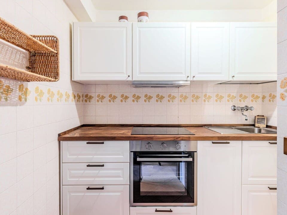 Cabinetry, Kitchen, Wood, Flooring, Countertop, Interior Design, Drawer, Home, Floor, Cupboard