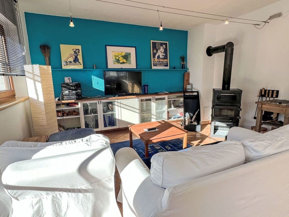 Furniture, Interior Design, Flooring, Wood, Floor, Room, Lighting, Living Room, Television, Ceiling