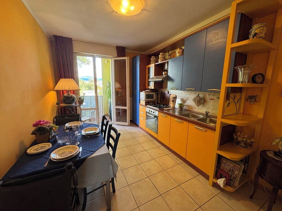 Flooring, Floor, Interior Design, Furniture, Apartment, Kitchen, Room, Major Appliance, Chair, Countertop