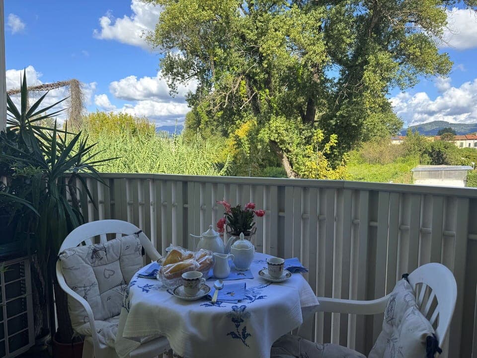 Furniture, Chair, Outdoor Table, Outdoor Furniture, Balcony, Shade, Serveware, Tablecloth, Kitchen & Dining Room Table, Yard