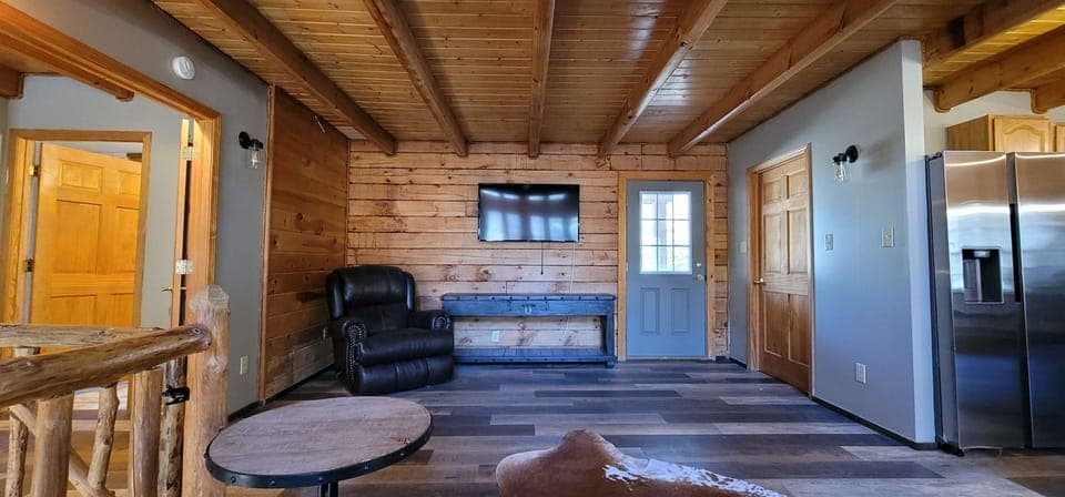 Rustic charm meets modern comfort with stylish furniture and inviting natural light!