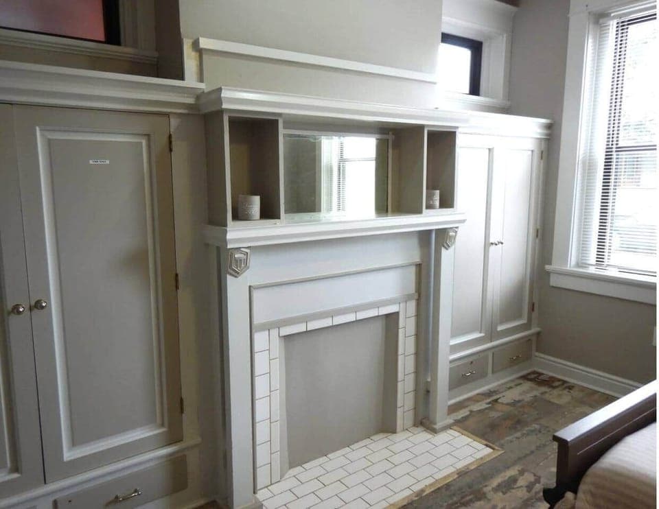 This is the built in cabinet.  Note the bed on the left.  Since the house was built in 1900 each room downstairs had it's own fireplace for heat.