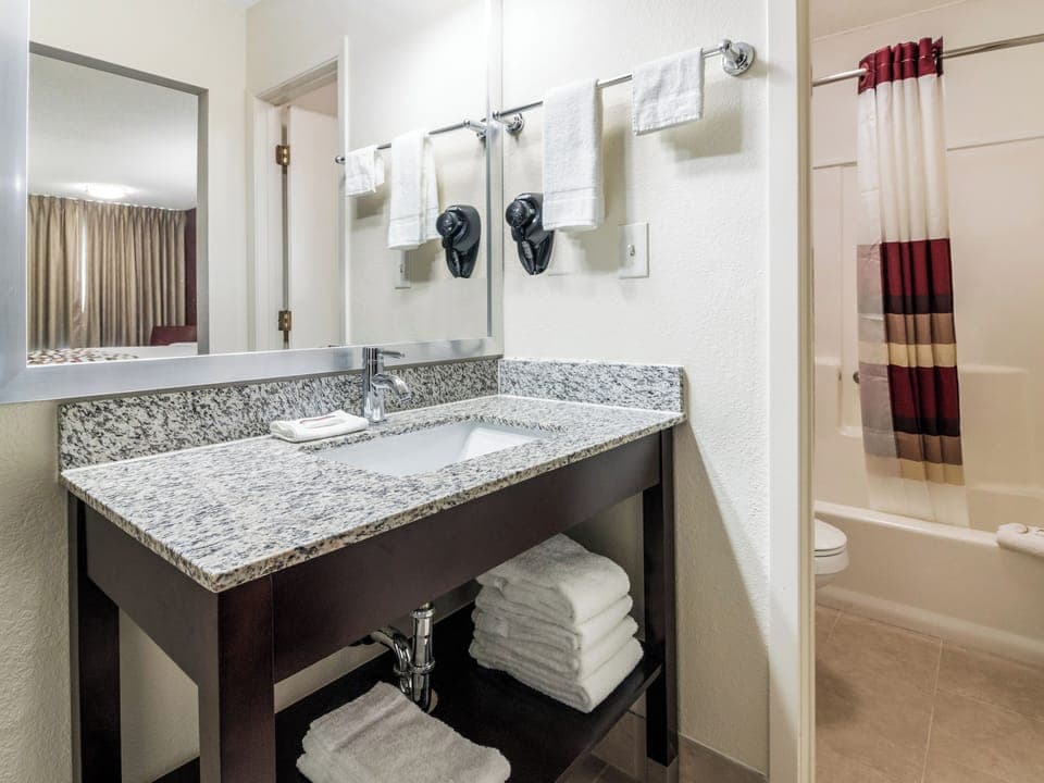 Start your day with a bright vanity and fresh towels.
