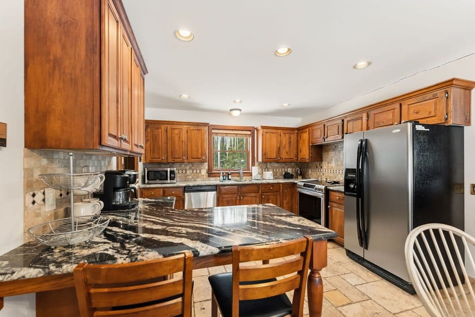 Kitchen: Drip coffee maker, Keurig, air fryer, blender, waffle maker, toaster, cooking utensils, tableware