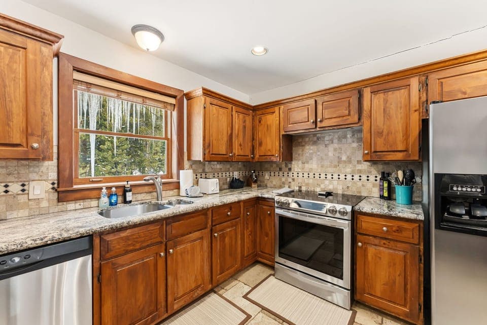 Kitchen: Drip coffee maker, Keurig, air fryer, blender, waffle maker, toaster, cooking utensils, tableware