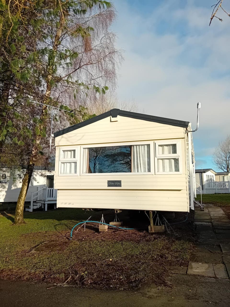 Cozy mobile home retreat with peaceful outdoor views