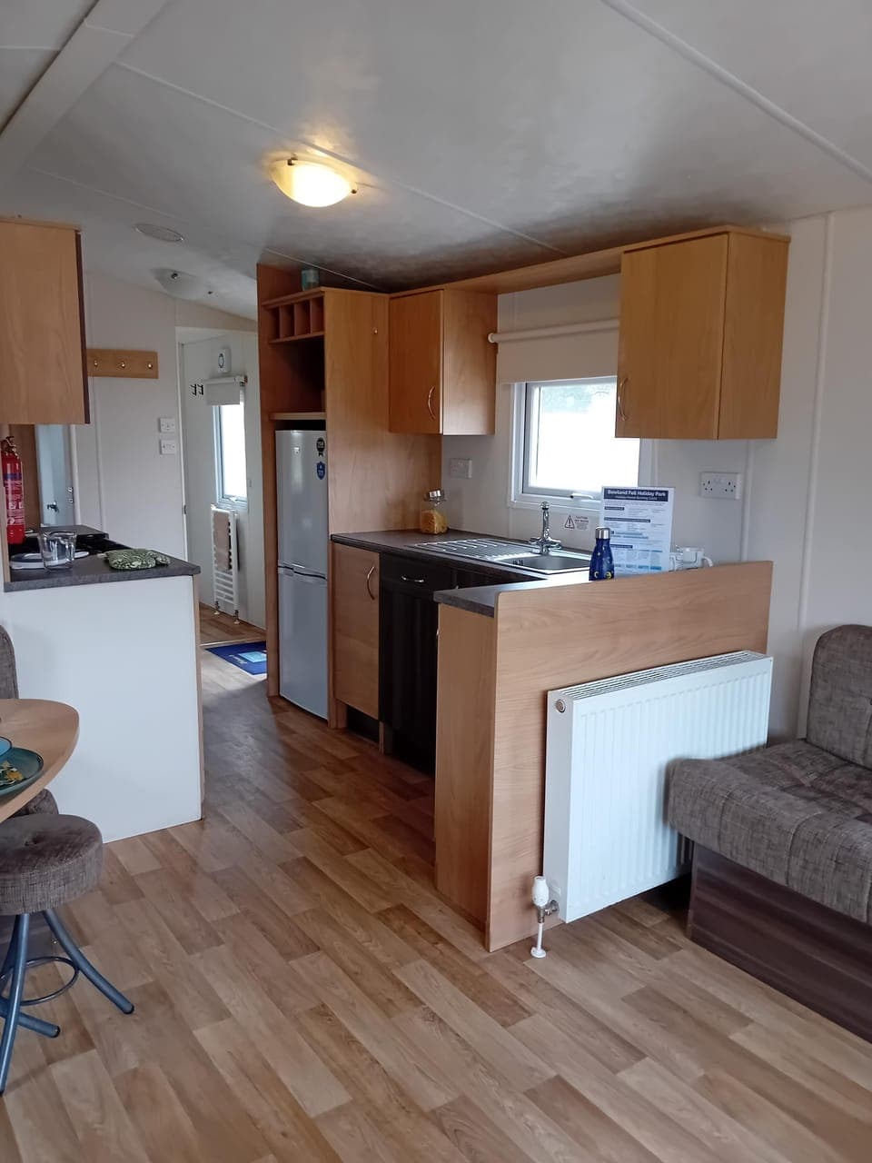 Cozy kitchen and dining area with warm wood accents