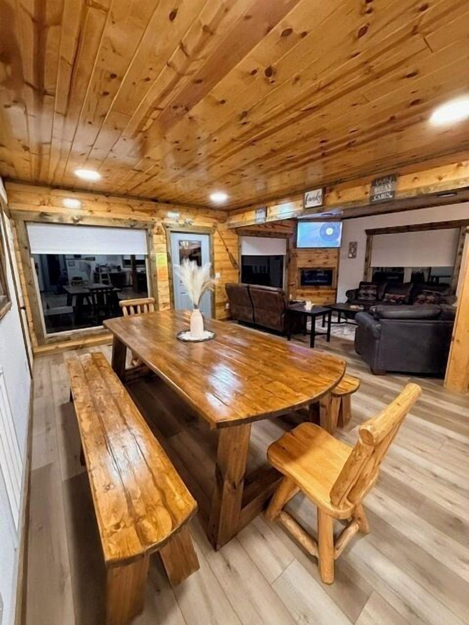 The extra large wooden dining room table is large enough for 12 people to sit comfortably!