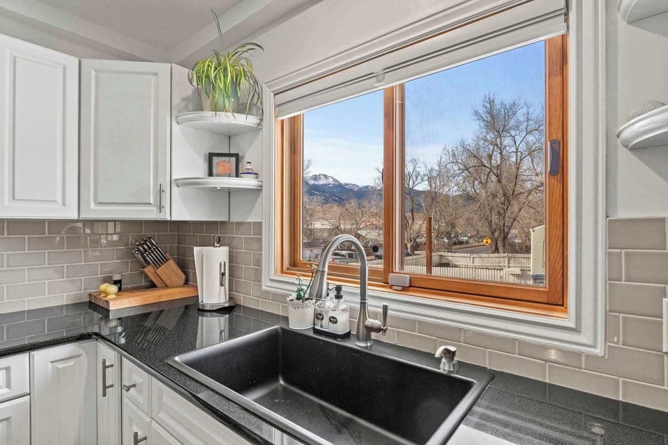 Fully equipped kitchen with natural light.