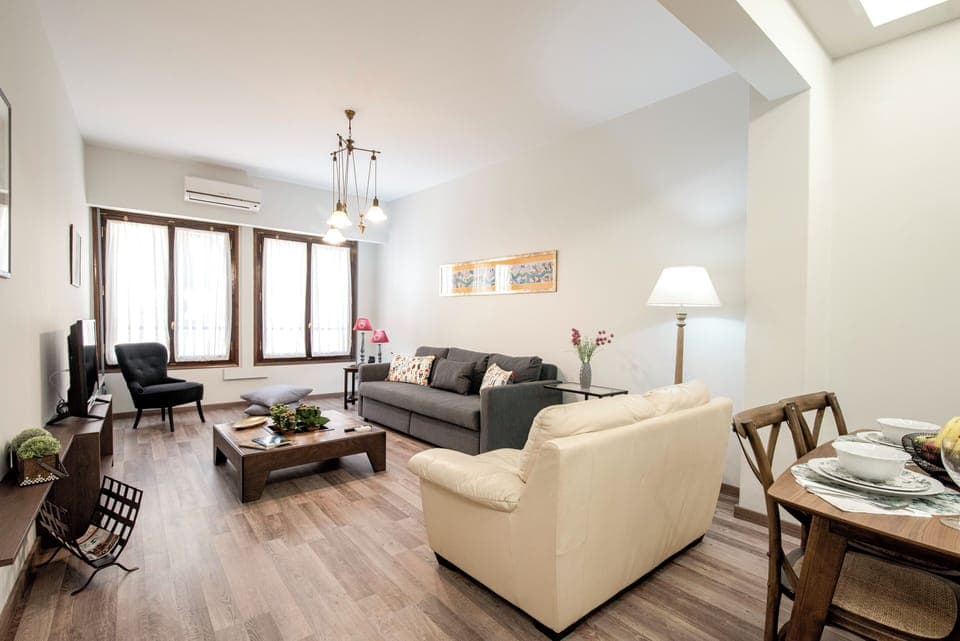 Expansive and light-filled living room.