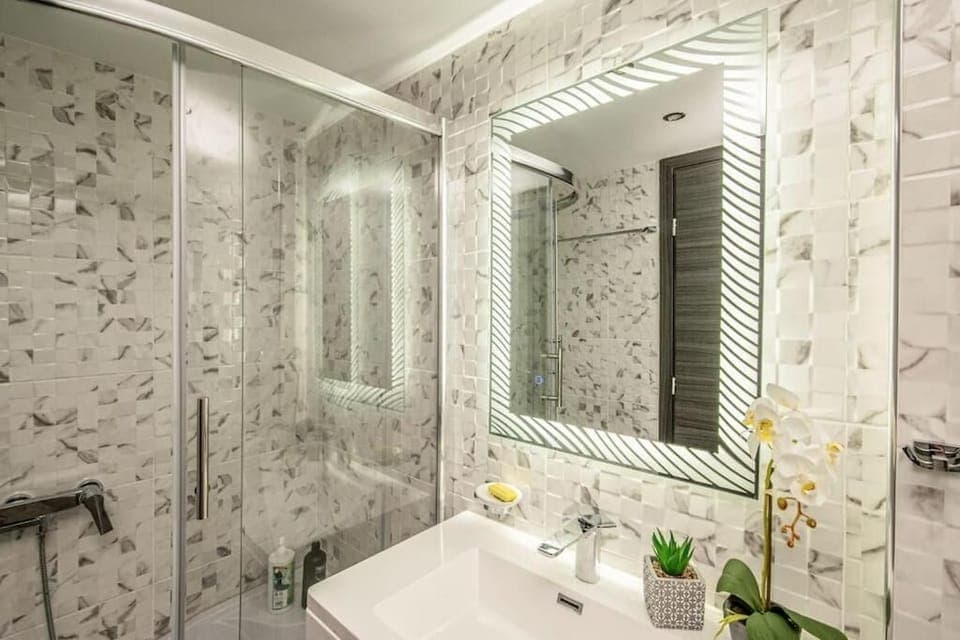 Modern bathroom with shower.