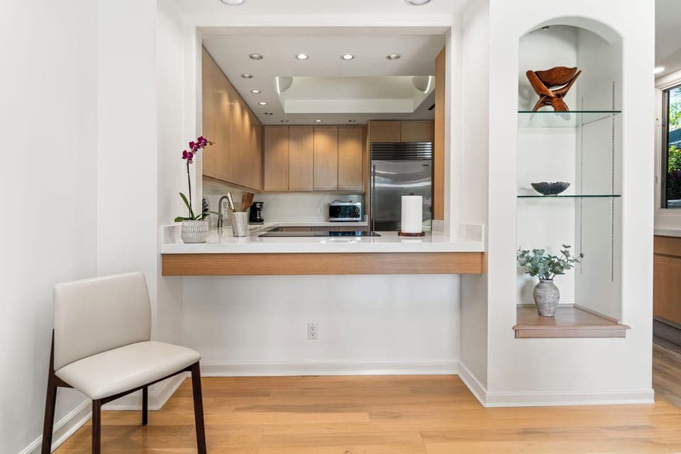 Designed for home chefs and extended stays, the gourmet kitchen is both stylish and highly functional