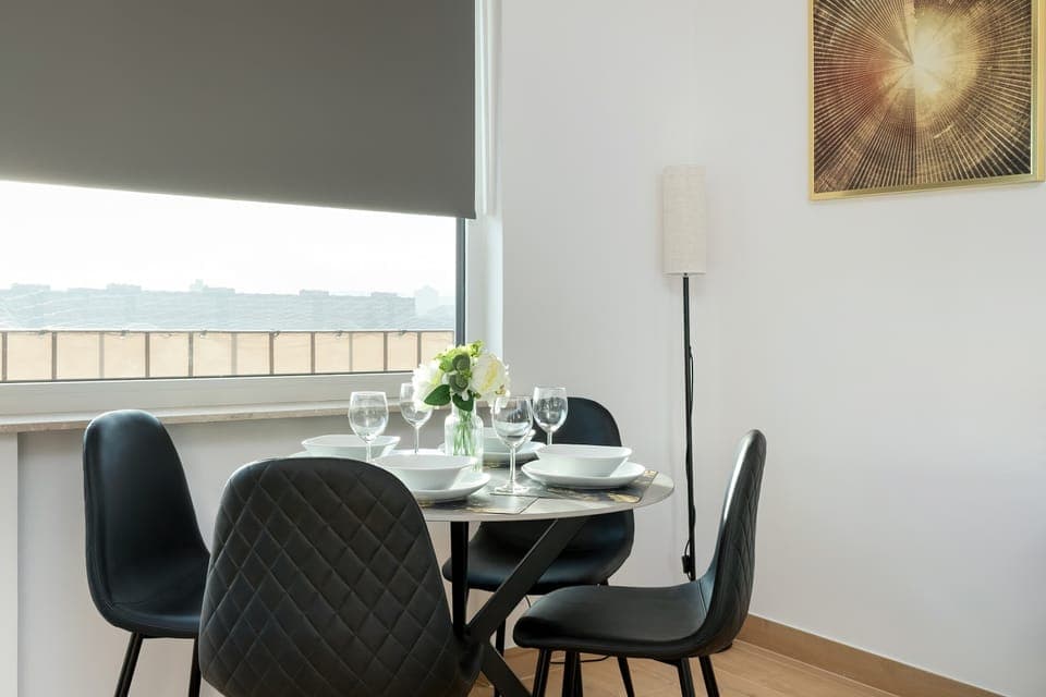 The living area's sleek design is both functional and aesthetically pleasing.