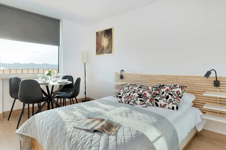 Enjoy your favorite shows on the flat-screen television in the elegant living area.