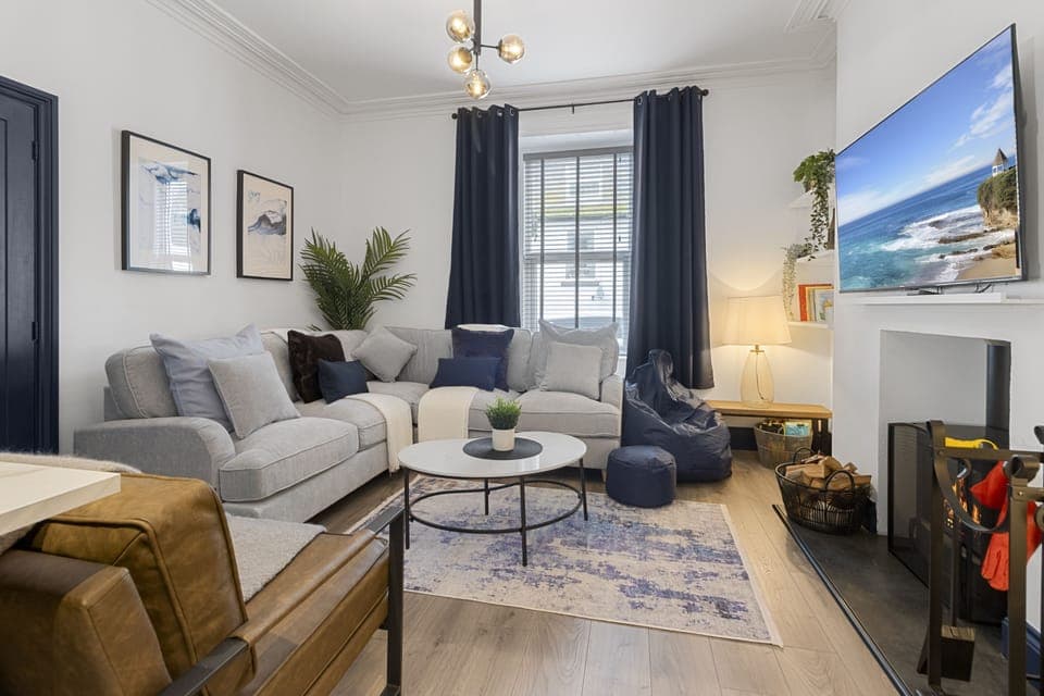 Cosy up in front of the log burner in the comfortable lounge