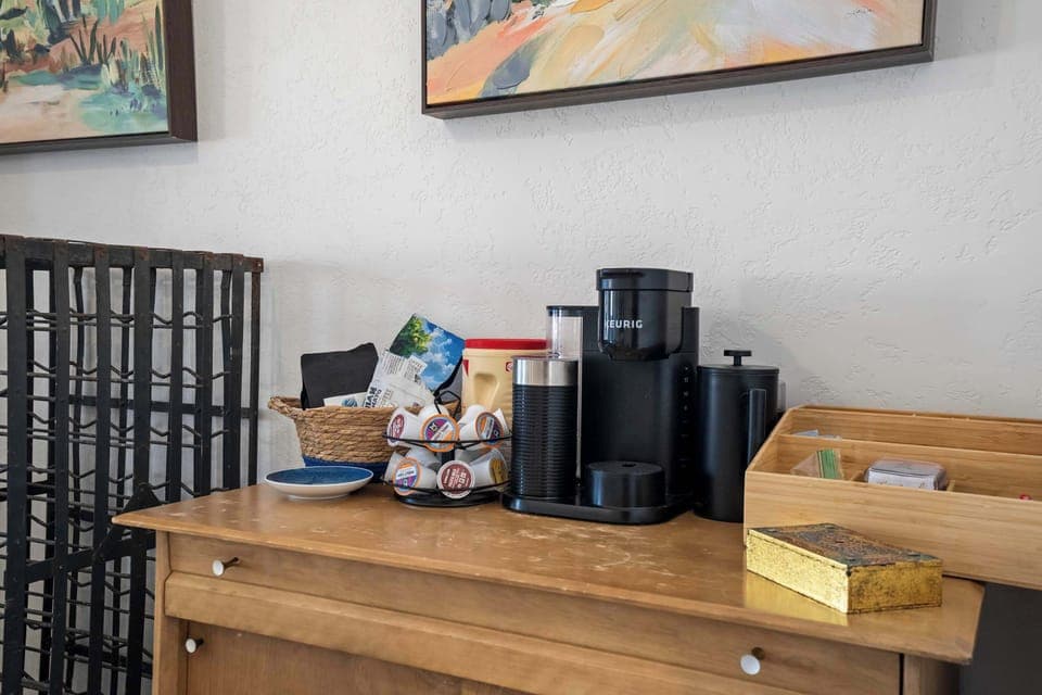 A complimentary coffee station with a Keurig and pods is provided for your stay. This convenience is part of the starter supply prepared to make your arrival as comfortable as possible.