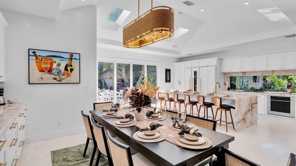 Your spacious open-plan kitchen and dining area features marble countertops, modern appliances, and elegant seating for memorable meals together.