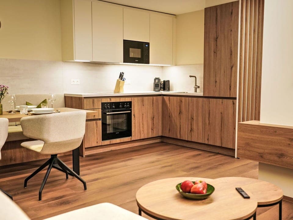 Furniture, Interior Design, Flooring, Wood, Wood Flooring, Floor, Cabinetry, Countertop, Kitchen, Apartment