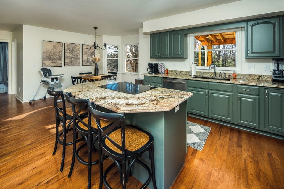 Share family meals and celebrate milestones around the large dining table. The fully stocked kitchen makes prepping group feasts a breeze.