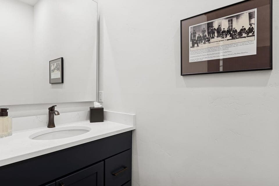 Freshen up in your elegantly appointed powder room, featuring clean lines and thoughtful touches.