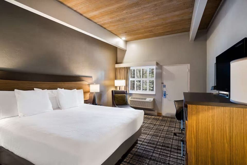 Stretch out on crisp linens in a bright, spacious room.