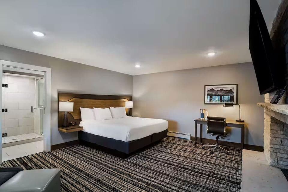 Settle in comfortably with king bed, desk workspace, and spa shower.