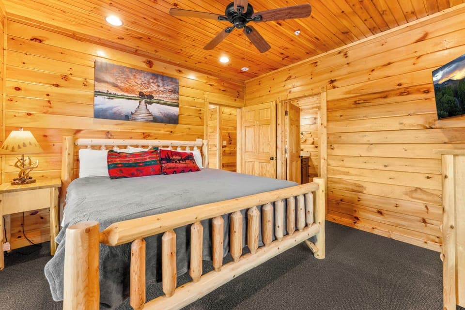 Relax in your King-sized retreat with direct access to the scenic porch.