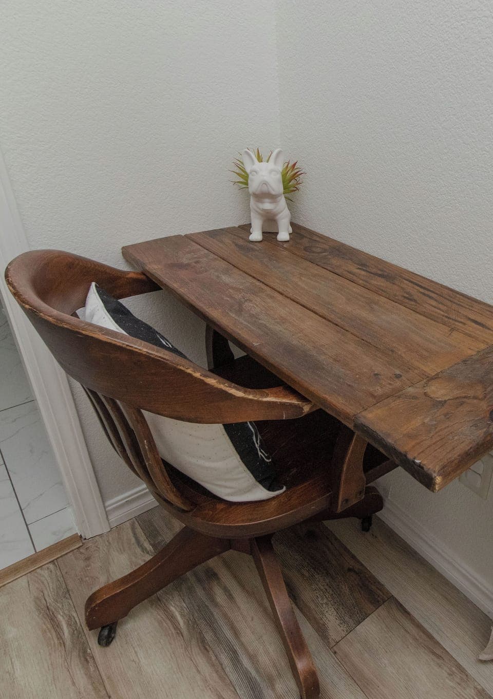 Cozy rustic desk nook w/vintage chair;perfect for work. Located in Primary suite