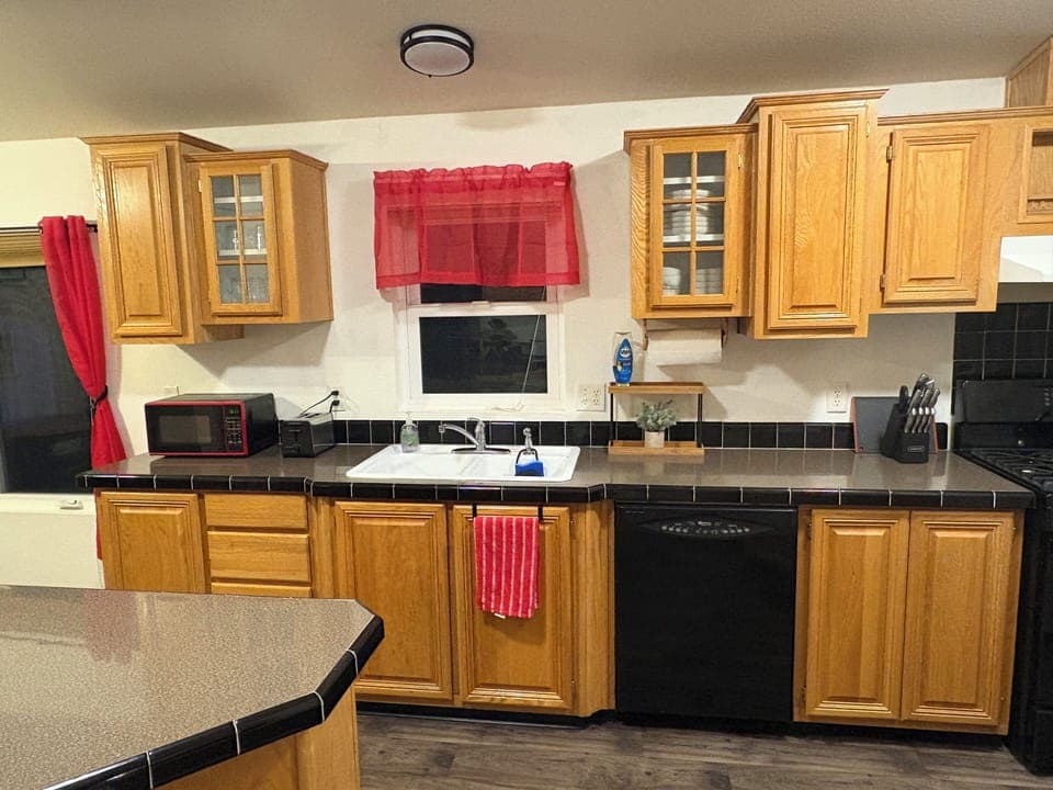 Dishes and kitchen utensils supplied. Microwave and toaster. Hand mixer.