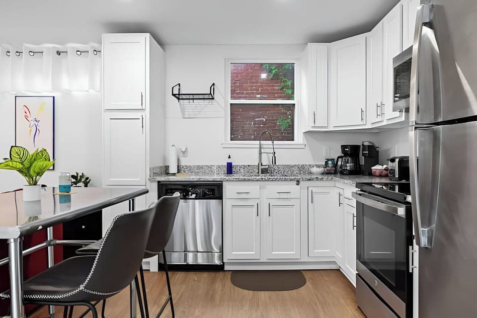 Kitchen - Unit 1: Enjoy cooking in our fully equipped kitchen with stainless appliances and ample natural light