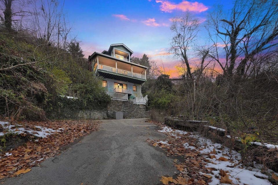 Arrive in style with this dramatic hillside entrance—your private getaway begins the moment you pull in.